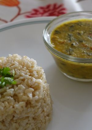 A picture of Dal Methi with brown rice.