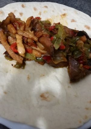 Una foto de Fajitas mejicanas con rovellones