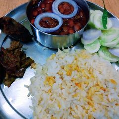 A picture of Rajma rice and bharwa parval.