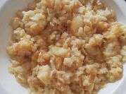 Una foto de patatas con ajo y vinagre