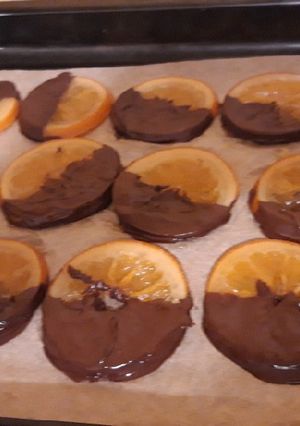 Une photo de Oranges confites en tranches