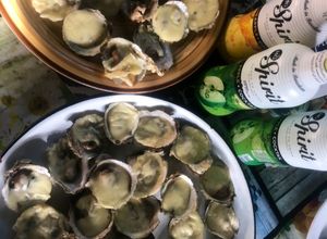 Una foto de Ostras a la Parmesana