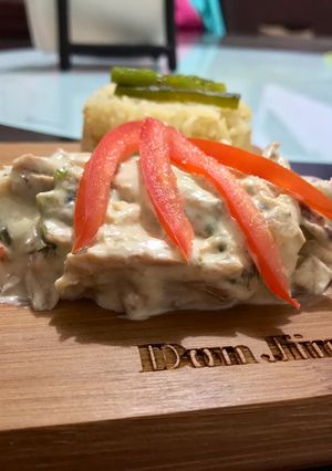 Una foto de Pollo en crema, versión caliente