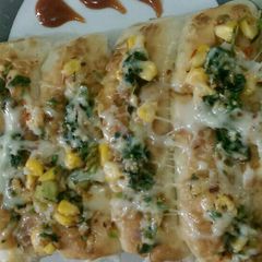 A picture of Cheese corn garlic bread.