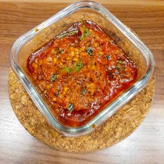 A picture of Red capsicum Thokku Pickle.