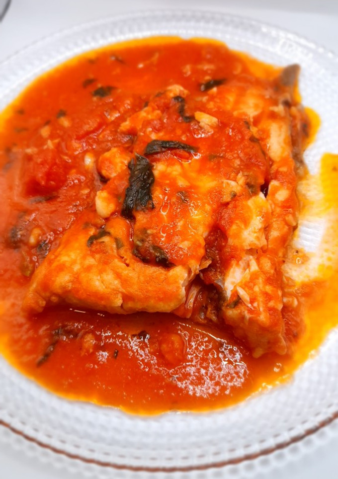 Una foto de Bacalao en albahaca y ajo