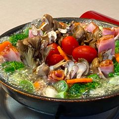 A picture of Vegetable Soup cooking together on the family table🎶.