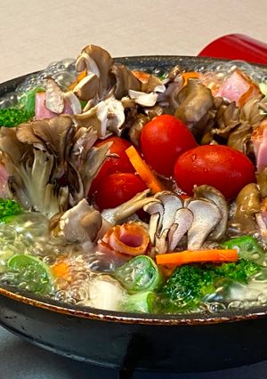 A picture of Vegetable Soup cooking together on the family table🎶.
