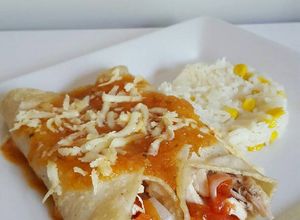Una foto de Enjitomatadas de pollo
