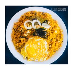 Eggplant rice with half boiled omelette A picture of Eggplant rice with half boiled omelette.