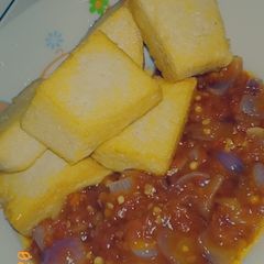 A picture of Tofu and sauce.