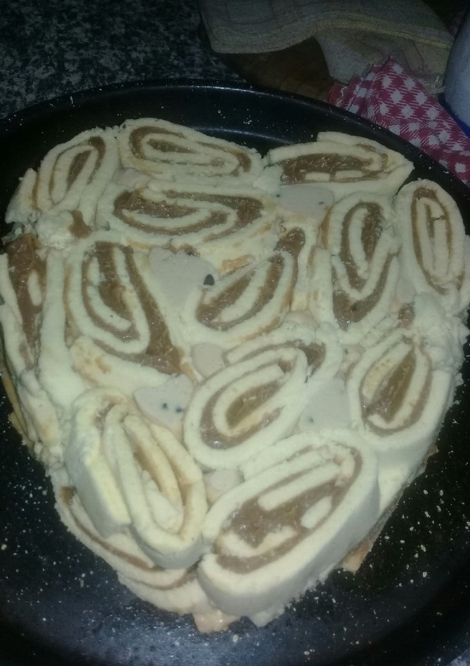 Una foto de Postre helado de dulce de leche y pionono