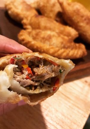 Una foto de Empanadas fritas de bondiola desmenuzada