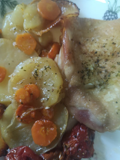 Una foto de Muslos de pollo al horno