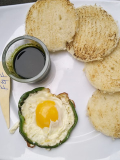 A picture of Egg with capsicum sides.