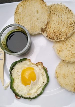 A picture of Egg with capsicum sides.