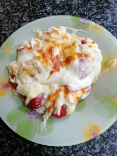 Una foto de Pimientos de piquillo relleno de bacalao en salsa bechamel