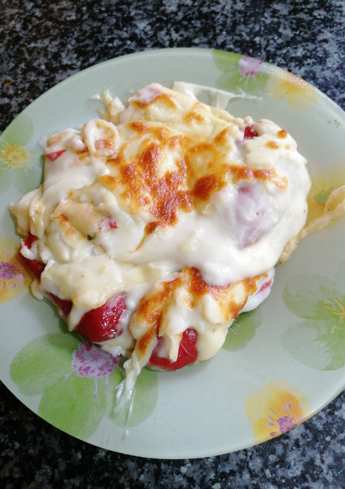 Una foto de Pimientos de piquillo relleno de bacalao en salsa bechamel