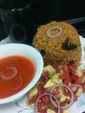 Pilau with spicy tomato soup
