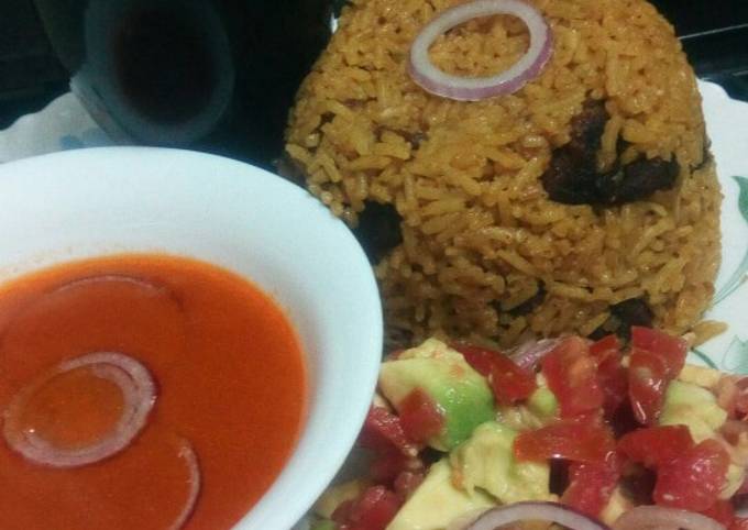 Pilau with spicy tomato soup