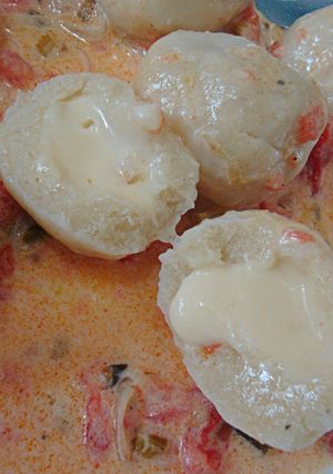 Una foto de Ñoquis rellenos de queso!