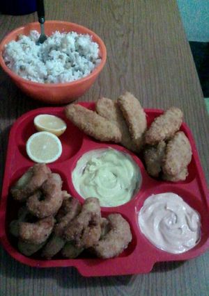 Una foto de Cena express langostinos y patitas de pollo rebozados