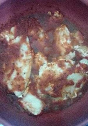 Una foto de Filete de pescado capeado en caldillo de jitomate