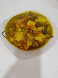 Una foto de Papas guisadas con carne