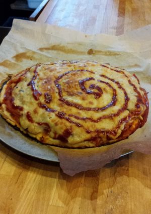 Una foto de Pizza queso y barbacoa