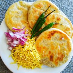 A picture of Famous Shegoan Kachori but tawa fried.