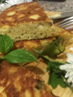 Una foto de Tortilla diferente con queso Griego