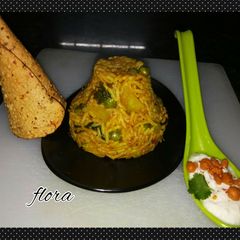 A picture of Instant masala rice with curd & papad.