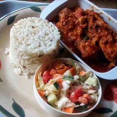 A picture of Chicken Chakalaka,white rice and Rainbow Salad.