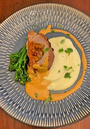 A picture of Prosciutto wrapped pork fillet with chorizo stuffing.