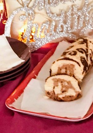 A picture of Patterned chocolate ice cream stuffed Swissrolls.