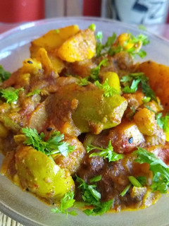 A picture of Achari aloo parwal.