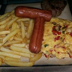 A picture of Breakfast: Chips & Egg.