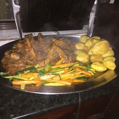 A picture of Kienyeji chicken,roasted potatoes and veggies.