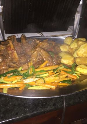 A picture of Kienyeji chicken,roasted potatoes and veggies.