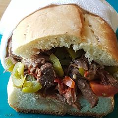 A picture of Italian beef with Italian cherry pepper giardiniera.