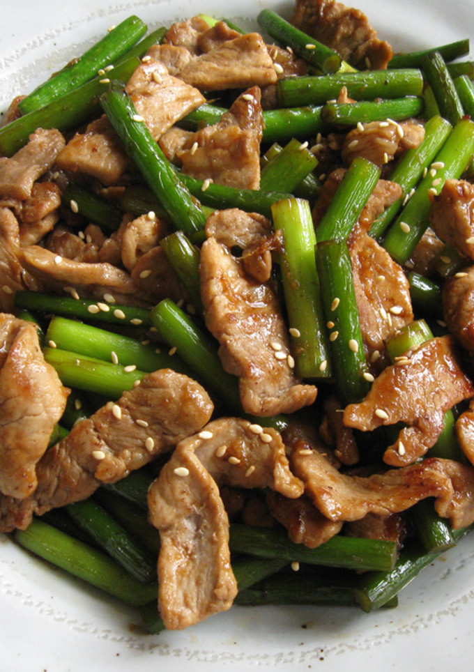 A picture of Pork & Garlic Shoots with Oyster Sauce.