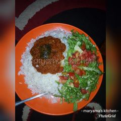 A picture of White rice & fish stew.