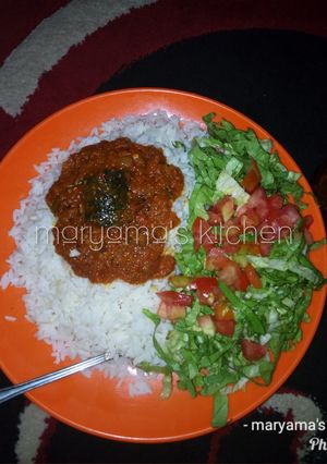 A picture of White rice & fish stew.