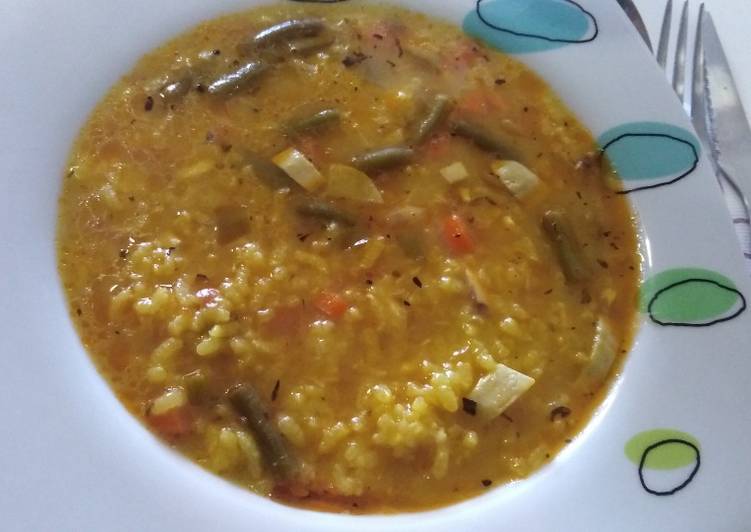 Arroz caldoso de pescado con verduras