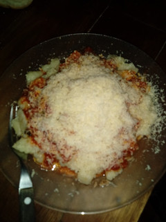 Una foto de Ñoquis de papa con salsa de tomate
