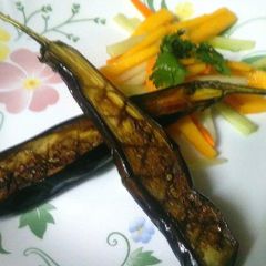 A picture of Egg plant mango salad.