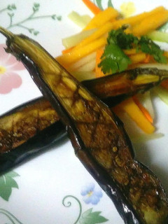A picture of Egg plant mango salad.