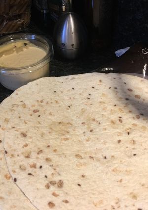 A picture of Houmous on wraps.