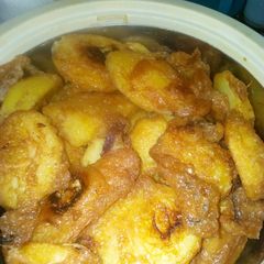 A picture of Fried potato and egg.