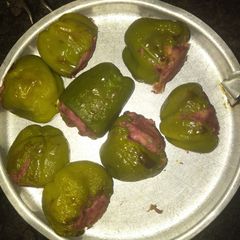 A picture of Stuffed capsicum and tomatoes for vegetables sizzler.